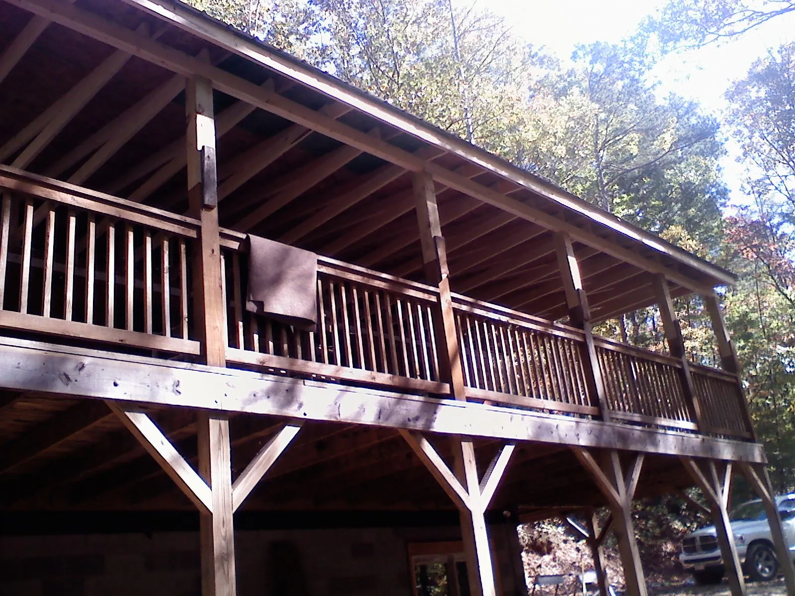 Timber framing under a new elevated porch and deck — Roof Leak Repair in East Lansing by Roofing Brothers